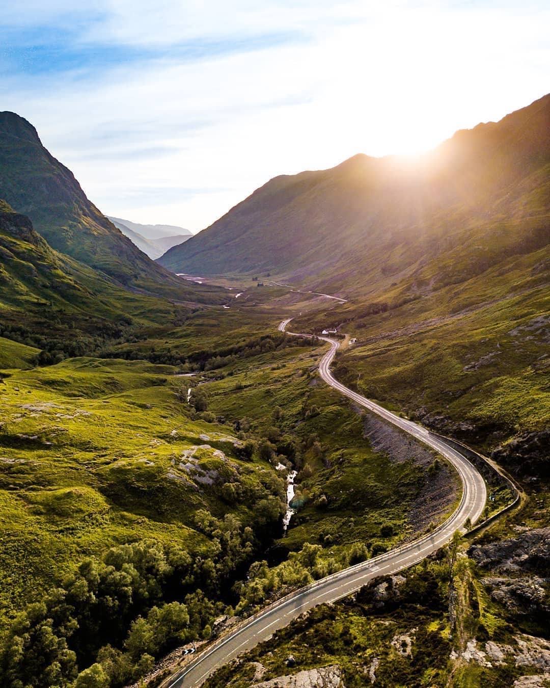 Sunrise over the road through Glen Coe